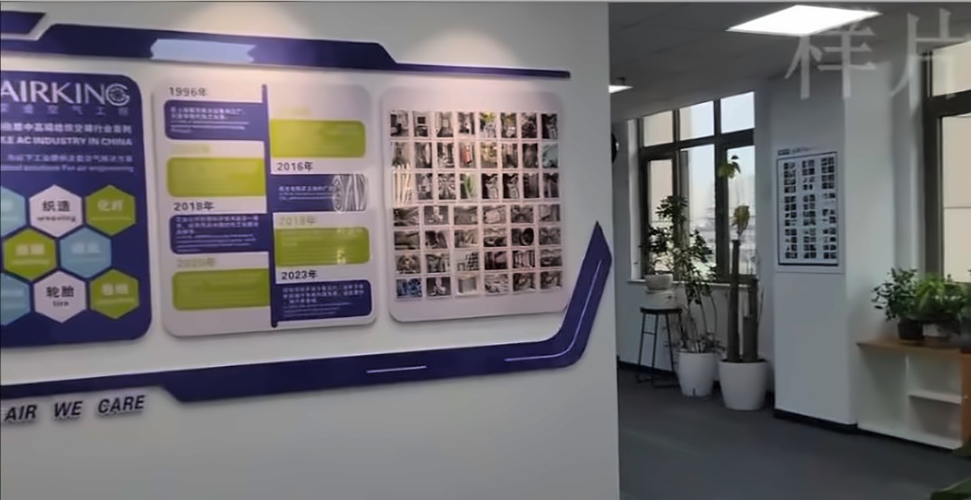 Head office wall showing AirKing's history timeline and project photos